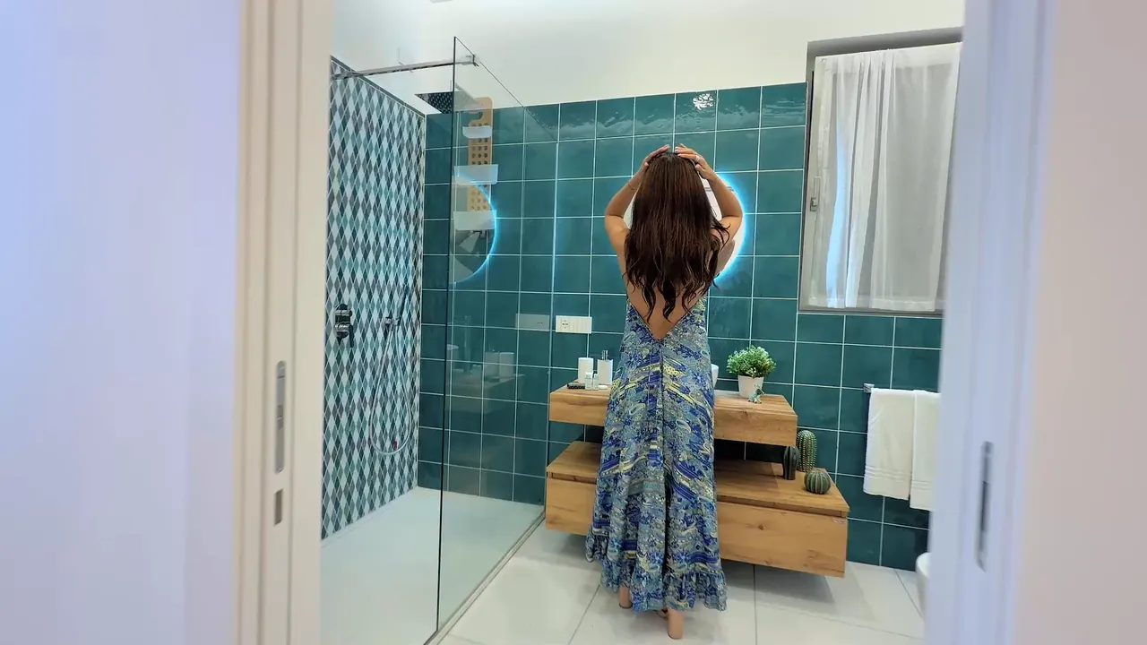 Il bagno con le piastrelle verdi